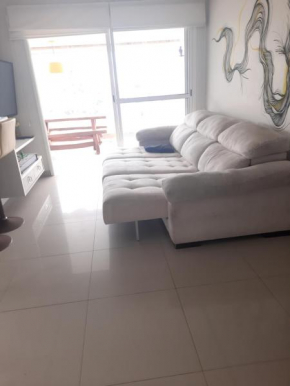 Apartamento planejado pé na areia
